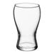 A close-up of a clear Libbey Mini Pub Beer Tasting Glass with a curved rim.