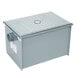 A grey metal Watts WD-20 Grease Interceptor box with a drain on top.