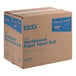 A cardboard box containing 12 rolls of Lavex Natural Kraft hardwound paper towels, each roll 600 feet long.