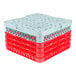 A stack of gray plastic Noble Products glass racks with red extenders.