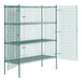 A Regency green wire security cage kit with open doors.