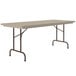 A mocha granite Correll rectangular folding table with a metal frame.