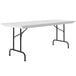 A gray granite Correll rectangular folding table with black legs.