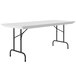 A gray granite Correll rectangular folding table with black legs.