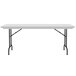 A gray granite Correll rectangular folding table with black legs.