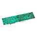 A green Turbo Air PCB board with electronic components.