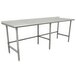 An Advance Tabco stainless steel work table with an open base.