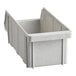 A white plastic Cambro Versa organizer bin with a handle.