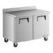 A large stainless steel True worktop refrigerator with two doors.