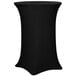 A black Snap Drape contour table cover on a black bar table.