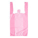 A pink plastic Choice medium-duty T-shirt bag with embossed handles.