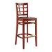 A Lancaster Table & Seating mahogany wood window back bar stool with a mahogany wood seat.
