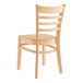A Lancaster Table & Seating wooden restaurant chair with a ladder back and natural wood seat.