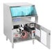 A Jackson DELTA 115 underbar glass washer machine with a blue cover.