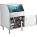 A Noble Warewashing electric carousel glass washer with the door open and blue water inside.