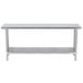 A silver rectangular Advance Tabco stainless steel work table with a shelf.