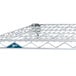 A Metro Super Erecta Brite wire shelf with a blue label.