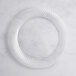 A clear Visions Wave plastic plate with a swirl pattern.