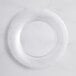 A Visions clear plastic plate with a spiral pattern.