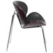 A mahogany bentwood reception chair with black leather upholstery and metal legs.