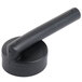 A black plastic object with a long black handle.