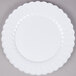 a white plate on a white surface