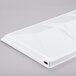 A white rectangular Hoshizaki baffle with a hole in the middle.