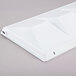 A white plastic Hoshizaki baffle with a hole.