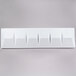 A white rectangular object with a triangle pattern.