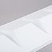 A white rectangular baffle with a triangle pattern.