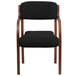 A Flash Furniture black fabric side chair with wooden legs.