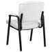 A Flash Furniture white leather executive side chair with black legs and arms.