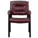 A burgundy leather Flash Furniture executive side chair with black legs.