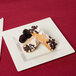 A Visions Florence ivory plastic plate with a pastry and berries on it.