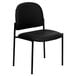A Flash Furniture black vinyl stackable side chair with metal legs.