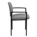 A gray Flash Furniture fabric side chair with black legs and arms.