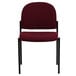 A burgundy Flash Furniture stackable side chair with black legs.