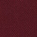 A close-up of burgundy fabric on a Flash Furniture stackable side chair.