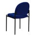 A navy fabric stackable side chair with black legs.