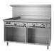 A stainless steel Garland commercial gas range with 2 ovens on a counter.