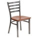 A Flash Furniture metal restaurant chair with a wooden seat and back.