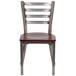 A Flash Furniture metal restaurant chair with a mahogany wood seat.