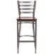 A Flash Furniture metal restaurant barstool with a mahogany wood seat.