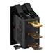 A black electrical device with a red on/off switch with silver and gold metal.