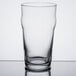 A Libbey English Pub glass on a table.