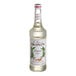 A 750 mL bottle of Monin almond syrup with a white label.
