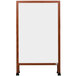 A cherry wooden A-Frame sign with a white marker board.