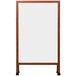 An Aarco cherry wood A-Frame sign board with white marker board.