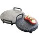 A Cal-Mil round faux slate serving board with tomatoes and mozzarella on it.