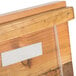 A close-up of a wooden Cal-Mil displayette box with a white label.